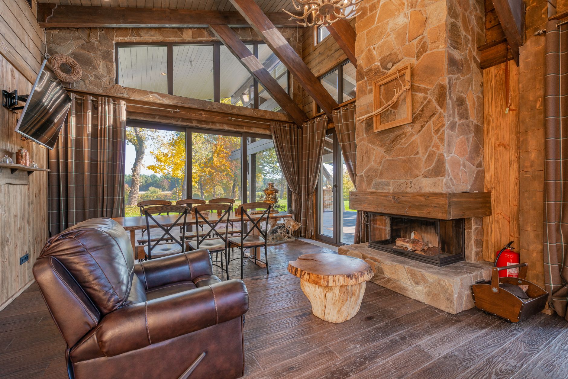 Warm interior of a rural lodge in Spain with fireplace and traditional furnishings