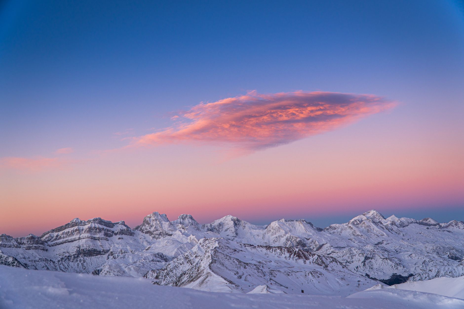 Snow-covered Pyrenean ridge in early morning light